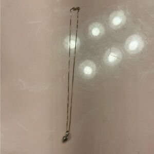 Silver necklace with strawberry